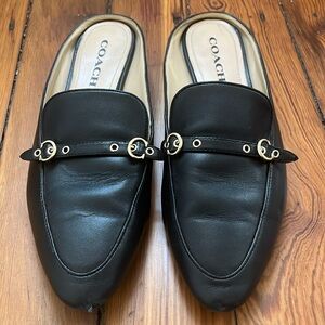 Coach black leather mules with gold hardware